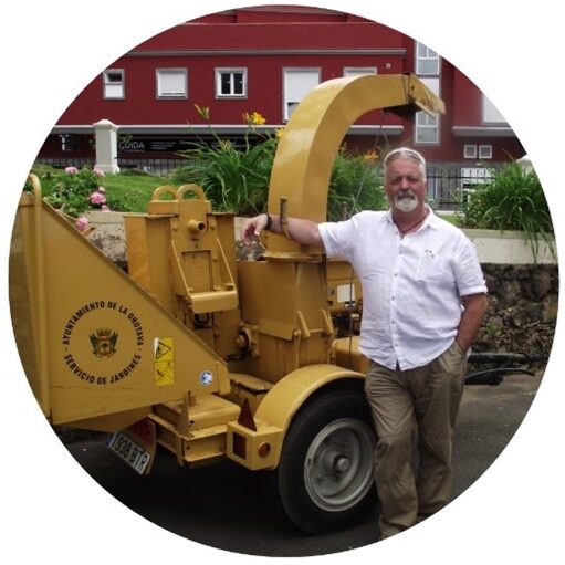 ian mcdermott with a wood chipper