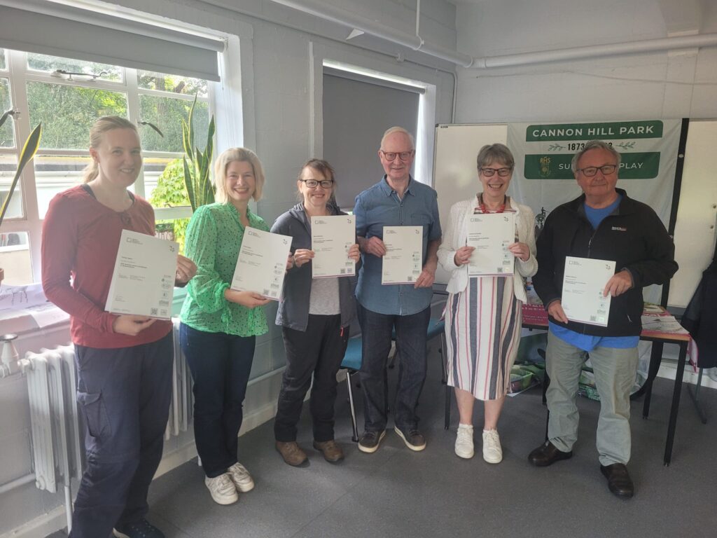 Six recipients holding their L2 Arboriculture awards