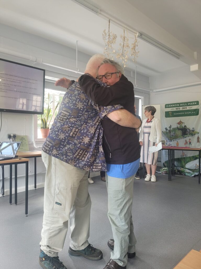 Steve hugging Mac whilst receiving his L2 Arboriculture certificate