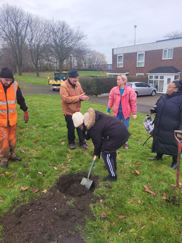 Agatha digging on Vauxhall Road for the tree planting