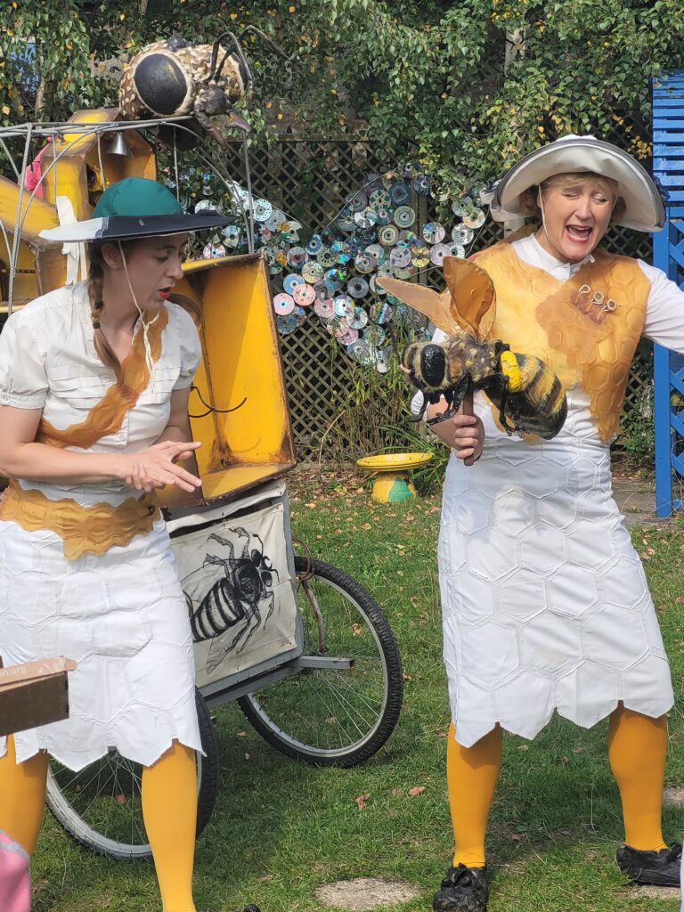 Sustainable Futures Festival at Caldmore Community Garden, Pif-Paf Theatre's Bee Cart performance