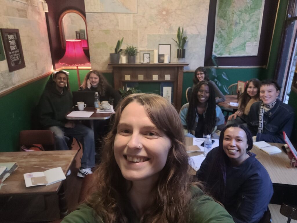 Charley taking a selfie with the group at the writing workshop