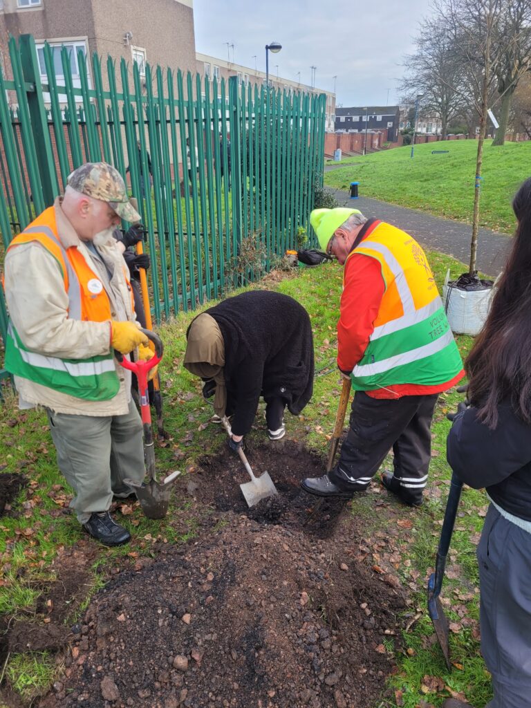 BCU students from the volunteer network planting The Zephaniah Forest trees with us