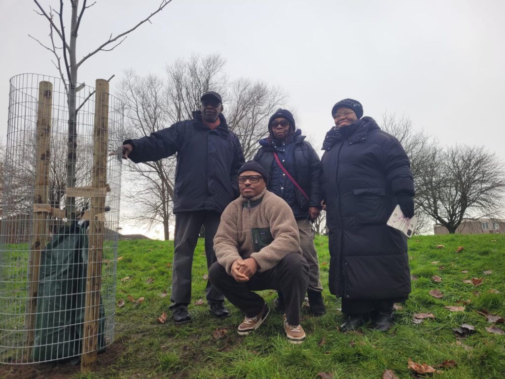 Family Legacy tree planting - left to right is Frank, David, Joyce, and Millicent.