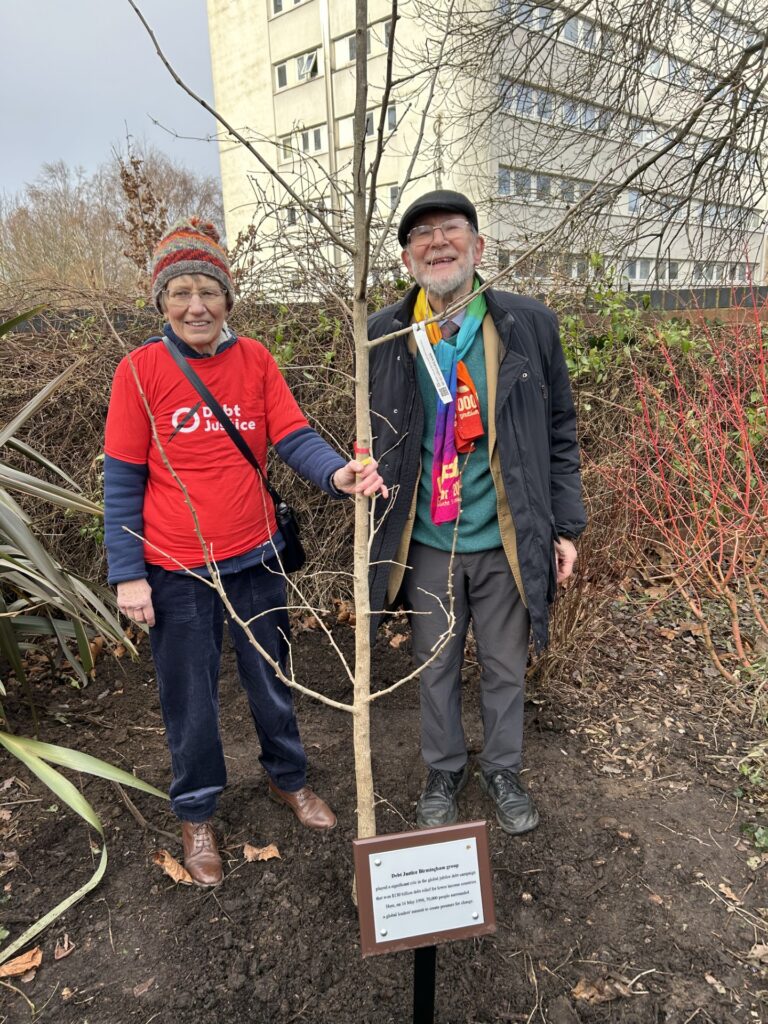 Ruth Tetlow with John Cotton for the Debt Justice Treemembrance planting.